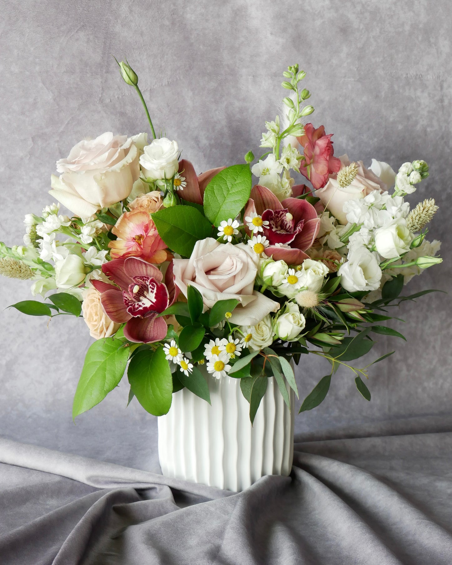 Flower Arrangement. Hat box. Flower Hat box Boston. Flower delivery Boston. Bouquet. Flower arrangement. Flower delivery Boston. Same Day Delivery. Flowers. Quincy Florist. Flower Delivery in Quincy.